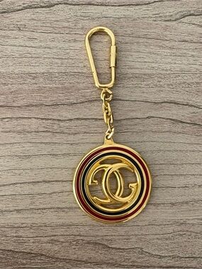 Gucci vintage GG Gold Tone Keychain Red Green Enamel Accent